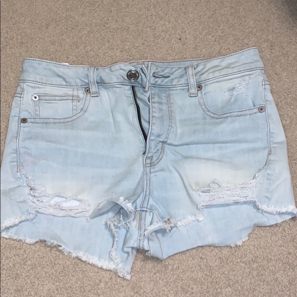 Light wash ripped jean shorts